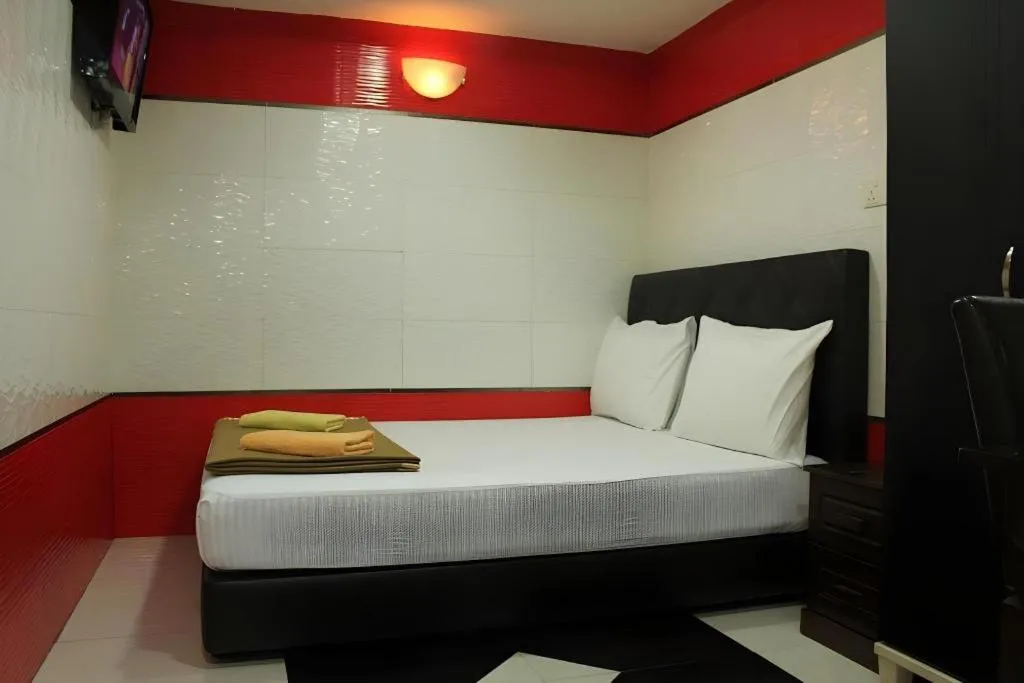 Bed in New Wave Hotel Melawati