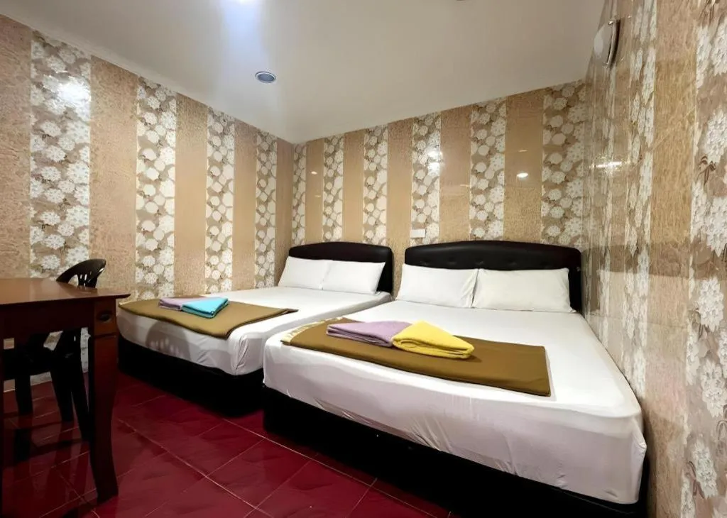 Bed in New Wave Hotel Melawati