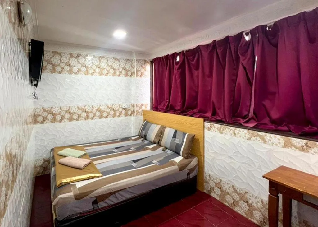 Bed in New Wave Hotel Melawati