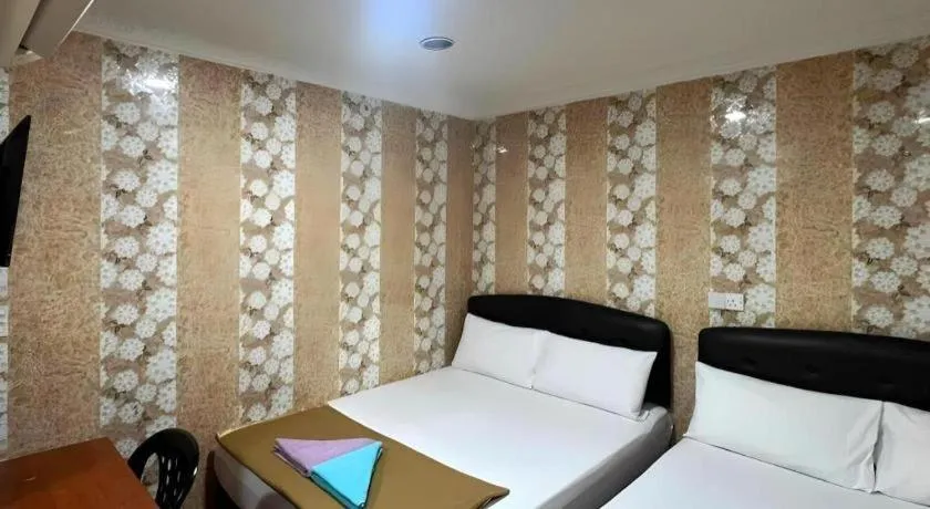 Bed in New Wave Hotel Melawati