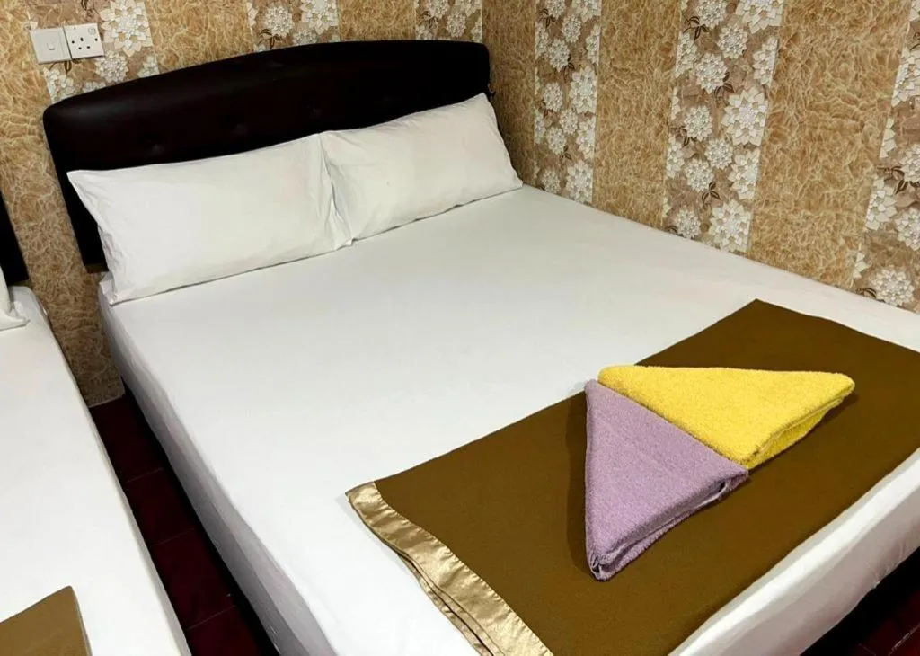Bed in New Wave Hotel Melawati