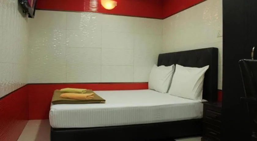 Bed in New Wave Hotel Melawati