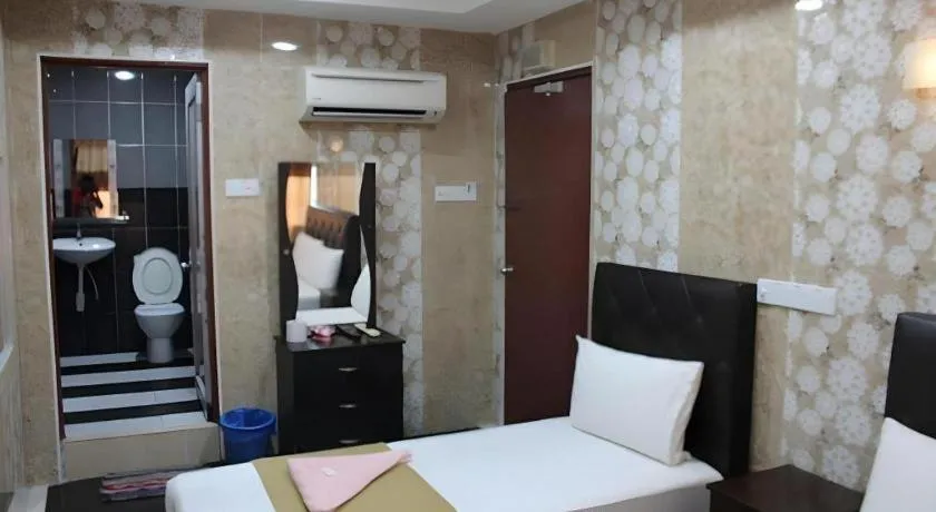 Bed in New Wave Hotel Melawati