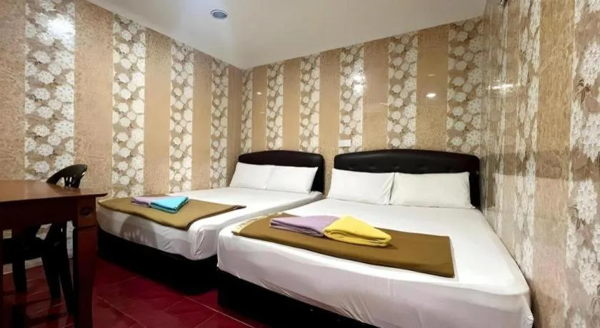 Bed in New Wave Hotel Melawati