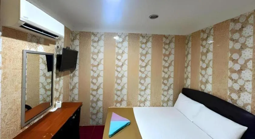 Bed in New Wave Hotel Melawati