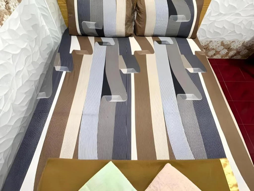 Bed in New Wave Hotel Melawati