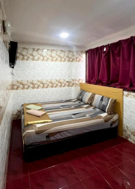 Bed in New Wave Hotel Melawati