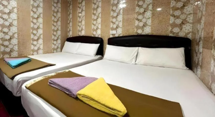 Bed in New Wave Hotel Melawati