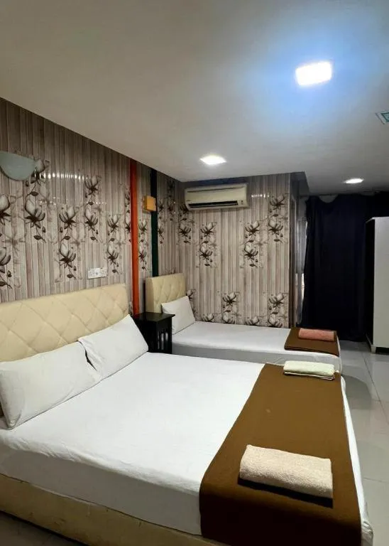 Bed in New Rawang Hotel