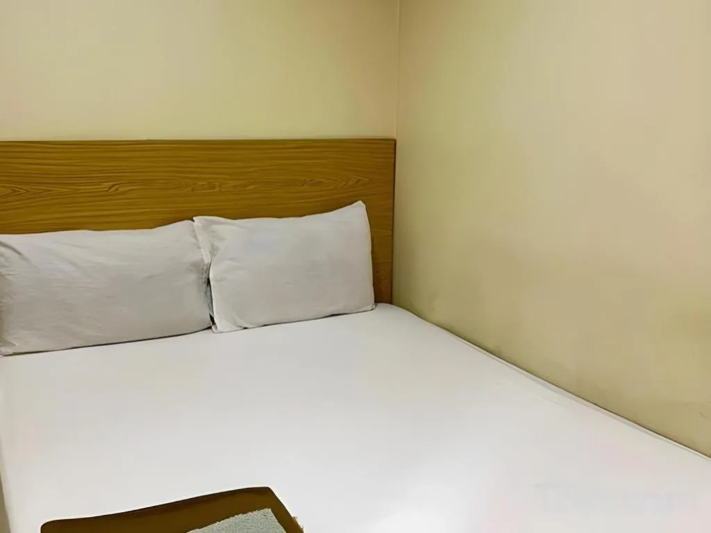 Bed in New Rawang Hotel