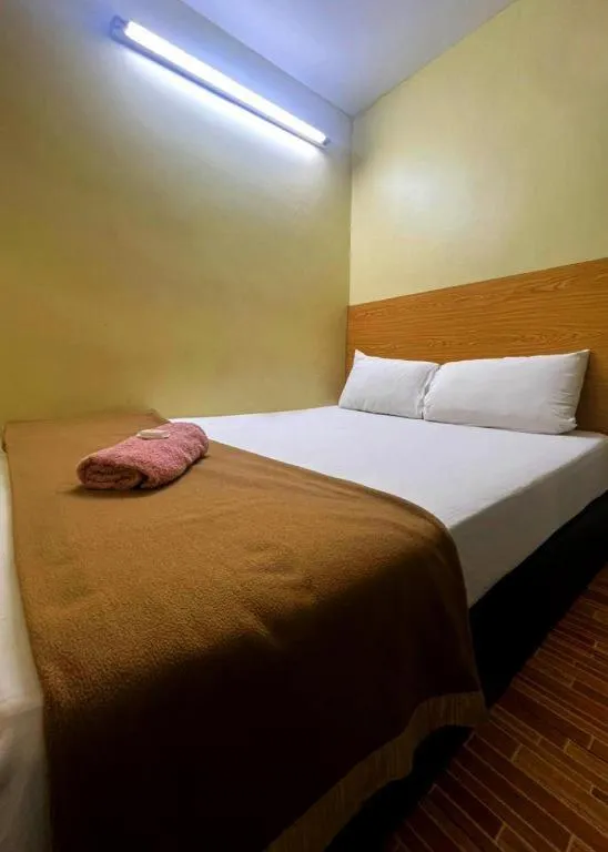 Bed in New Rawang Hotel