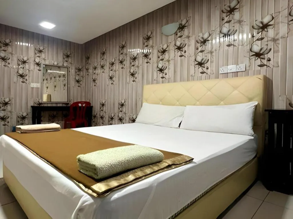 Bed in New Rawang Hotel