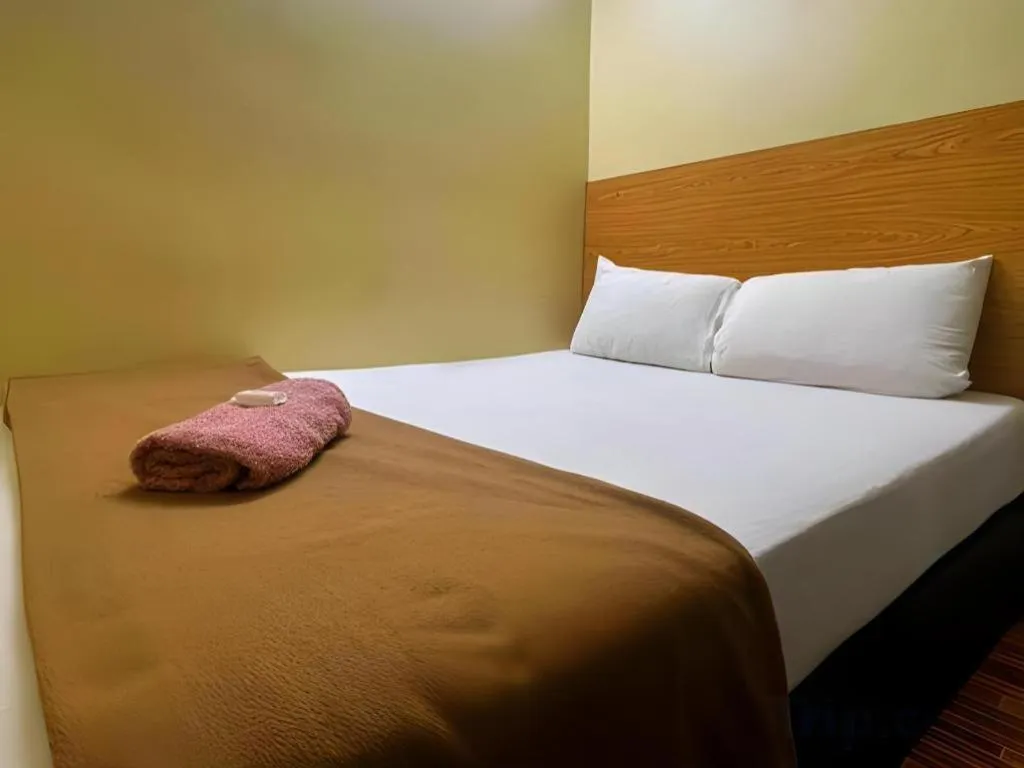 Bed in New Rawang Hotel