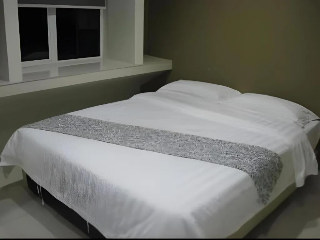 Bed in Hii-5 Hotel