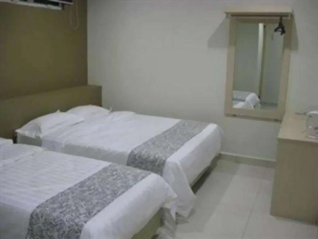 Bed in Hii-5 Hotel