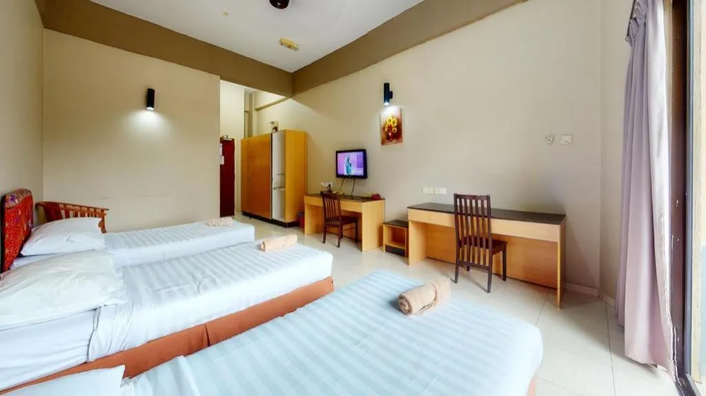 Bed in City Times Hotel