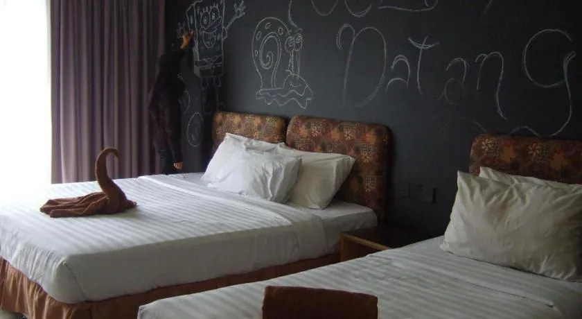 Bed in City Times Hotel