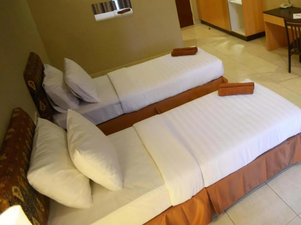 Bed in City Times Hotel