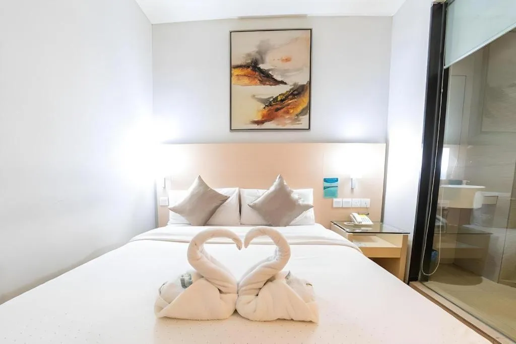 Bed in Hotel City Comfort Inn