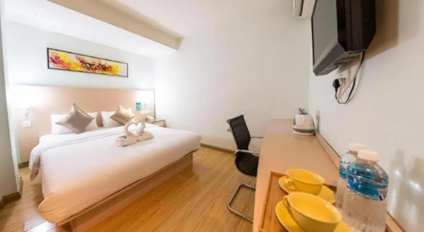 Bed in Hotel City Comfort Inn