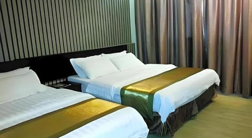 Bed in Goldenhill Hotel
