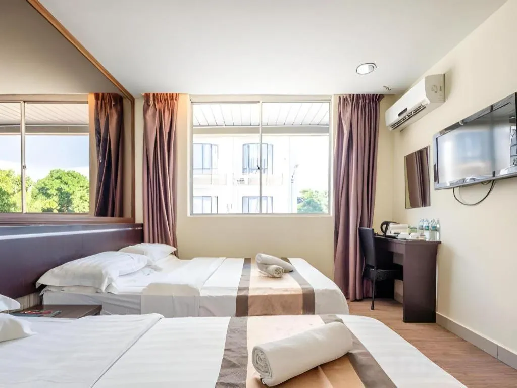 Bed in Goldenhill Hotel