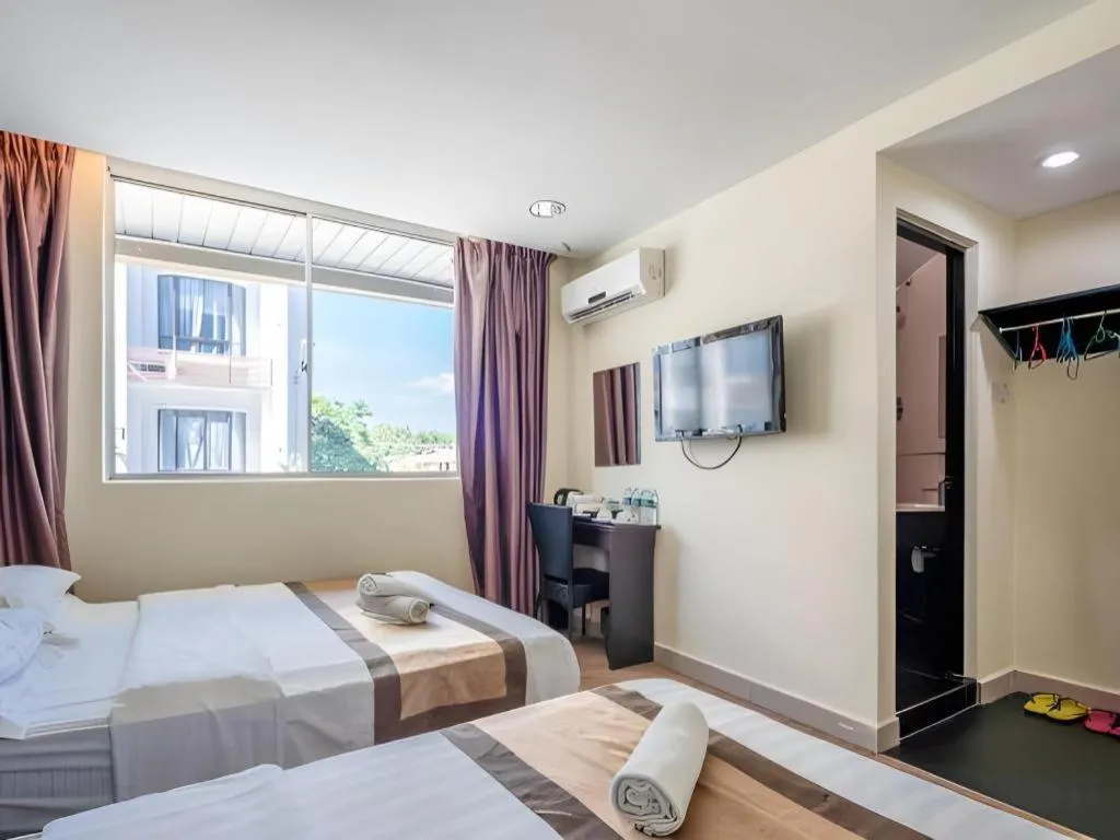 Bed in Goldenhill Hotel