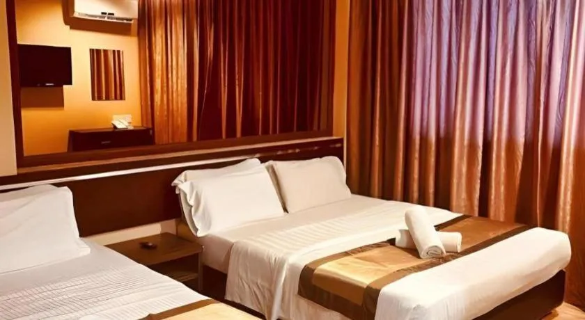 Bed in Goldenhill Hotel