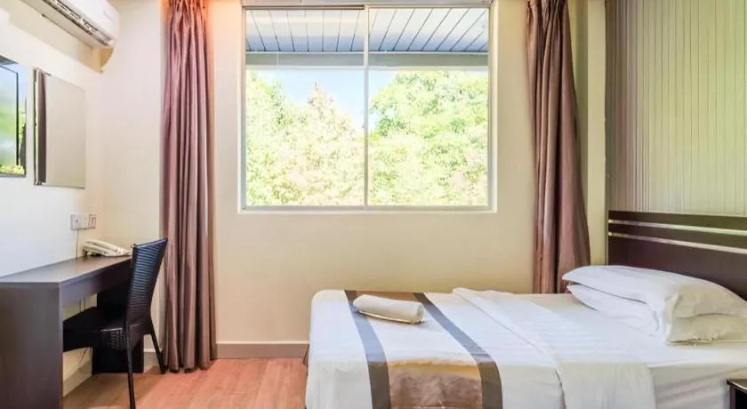 Bed in Goldenhill Hotel