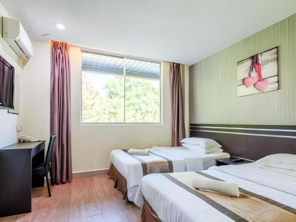 Bed in Goldenhill Hotel