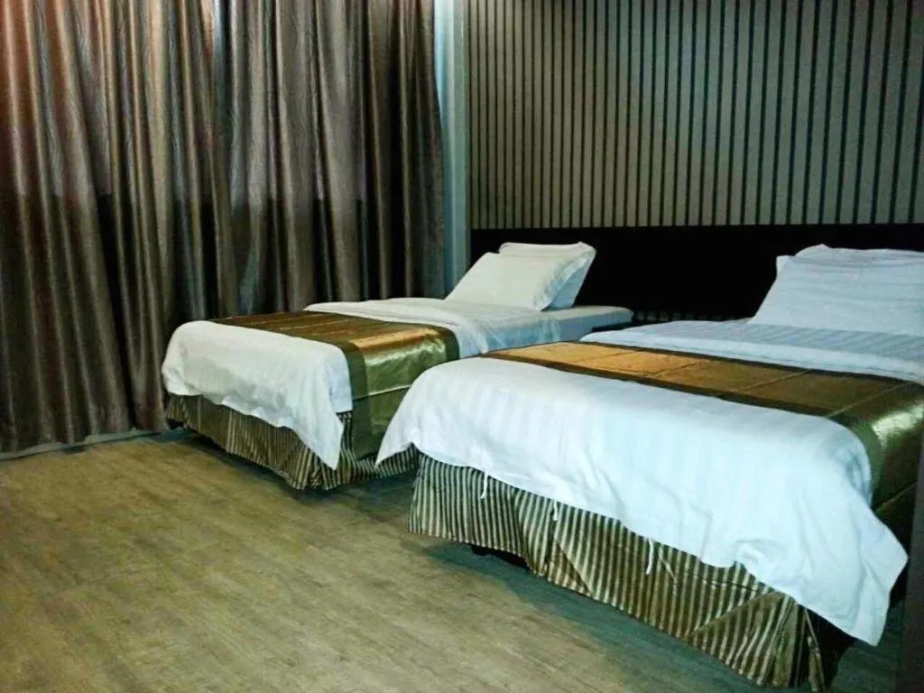 Bed in Goldenhill Hotel