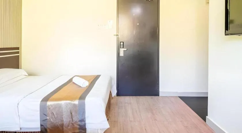 Bed in Goldenhill Hotel