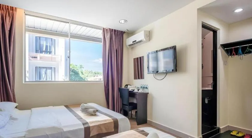 Bed in Goldenhill Hotel