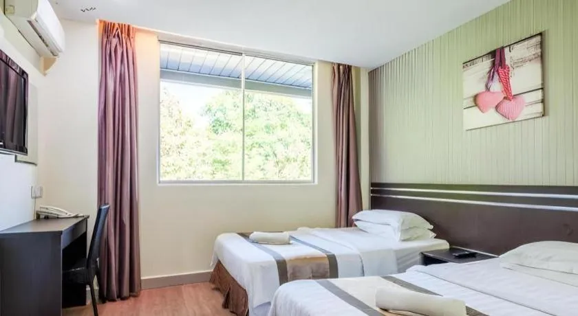 Bed in Goldenhill Hotel