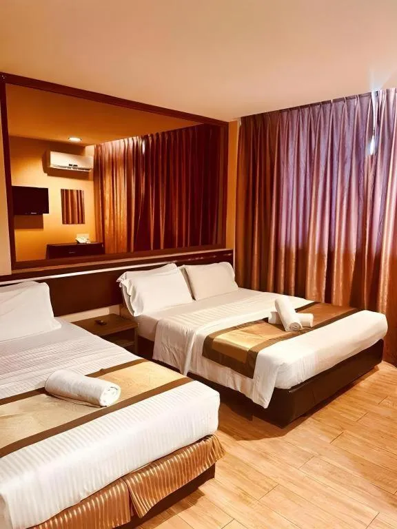 Bed in Goldenhill Hotel