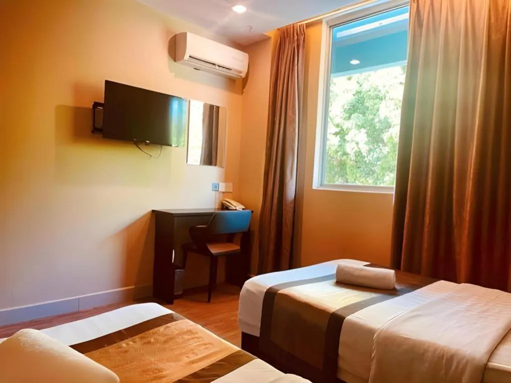 Bed in Goldenhill Hotel