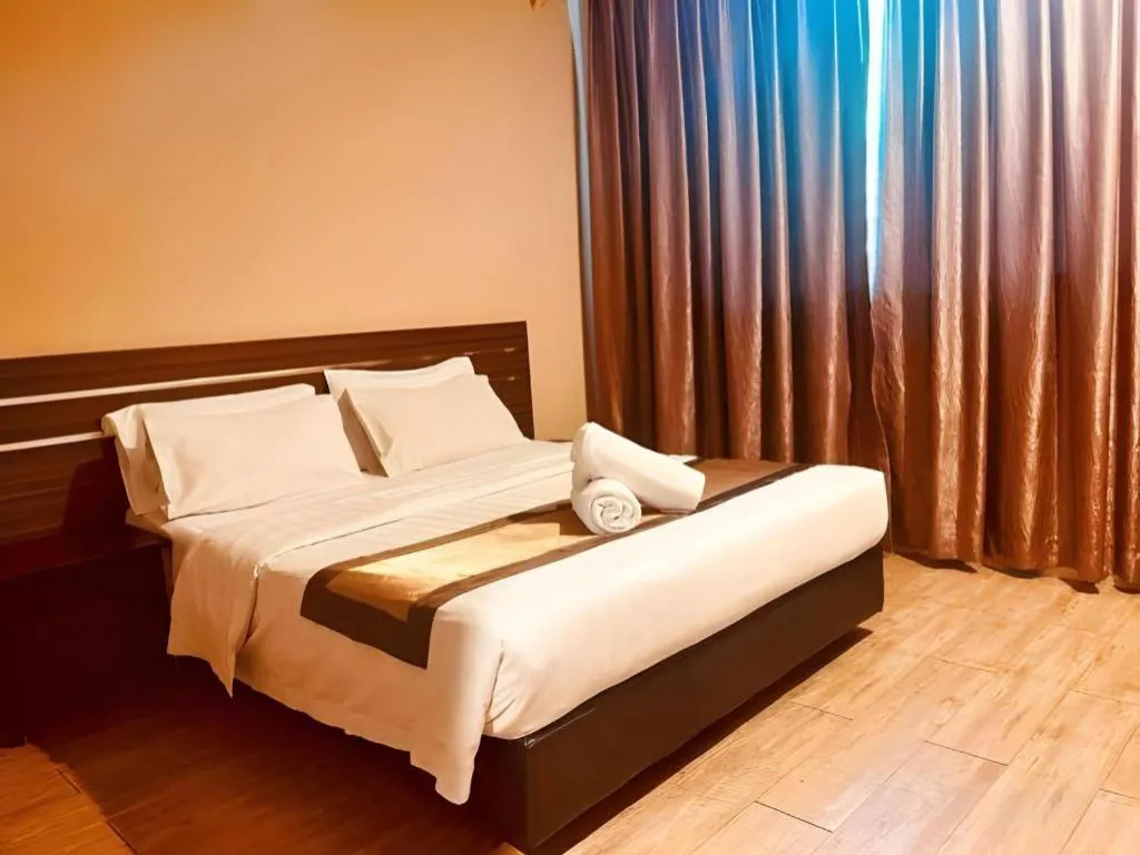 Bed in Goldenhill Hotel