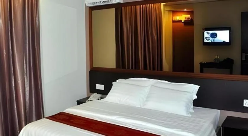 Bed in Goldenhill Hotel