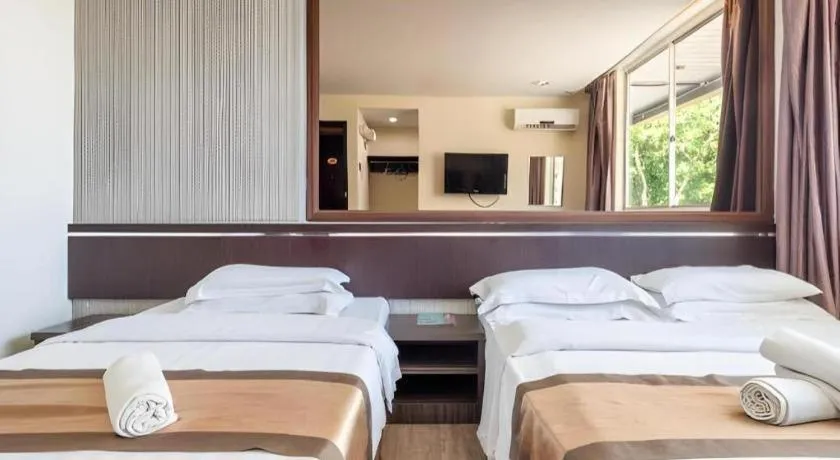 Bed in Goldenhill Hotel