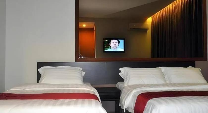 Bed in Goldenhill Hotel