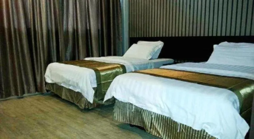 Bed in Goldenhill Hotel