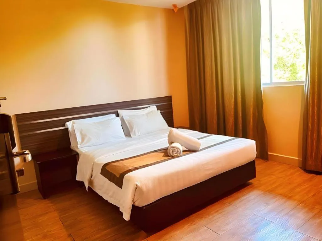 Bed in Goldenhill Hotel