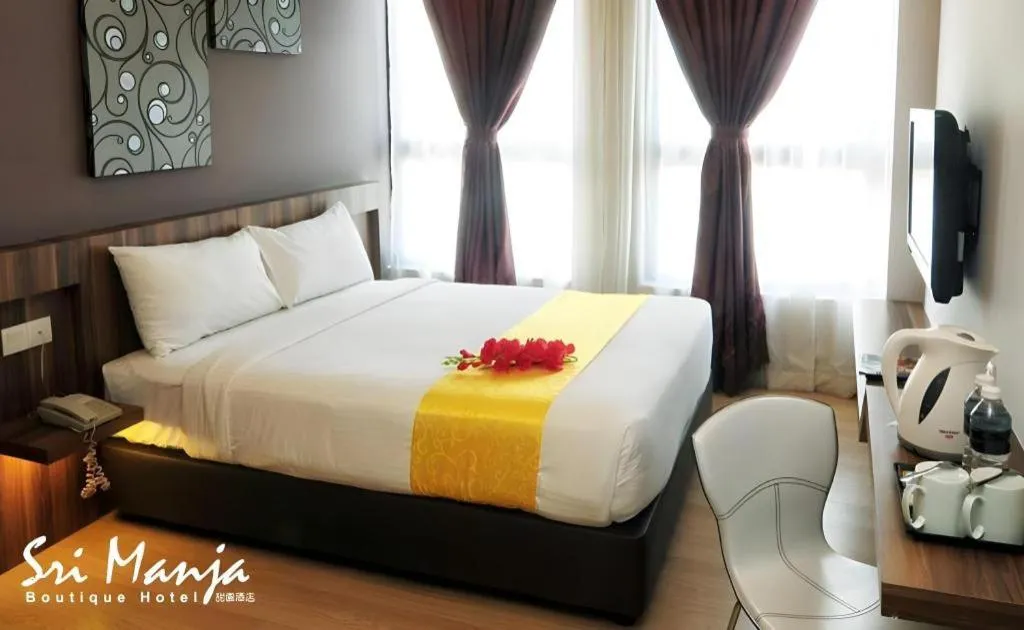 Bed in Sri Manja Boutique Hotel