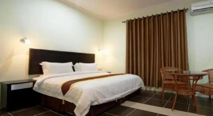 Bed in Han Palace Hotel Semporna Bed in Han Palace Hotel Semporna