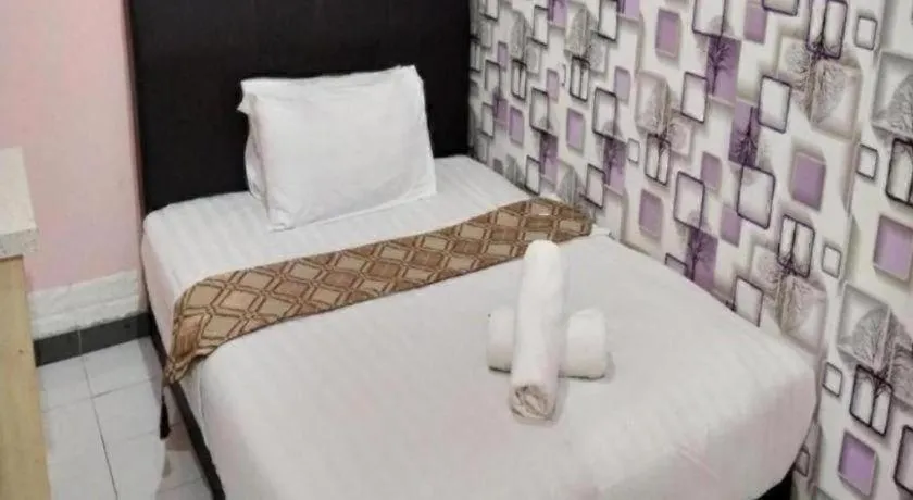 Bed in Hotel Zamburger Sungai Besi