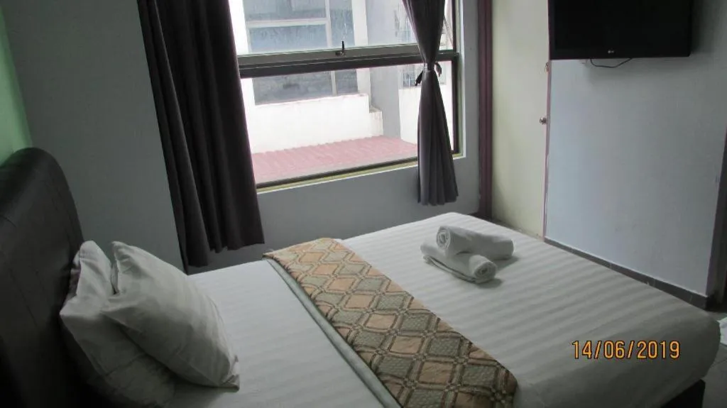 Bed in Hotel Zamburger Sungai Besi