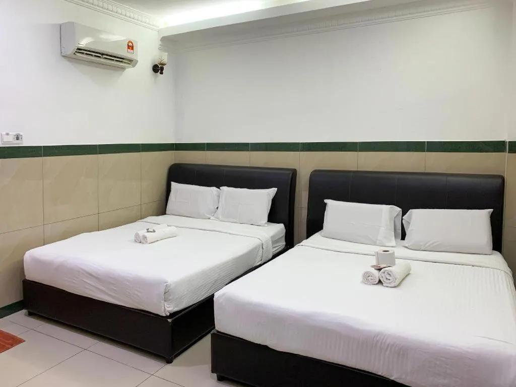 Bed in Burmahtel Hotel