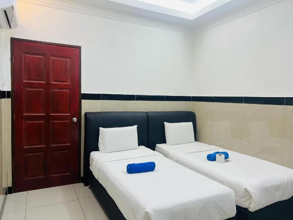 Bed in Burmahtel Hotel