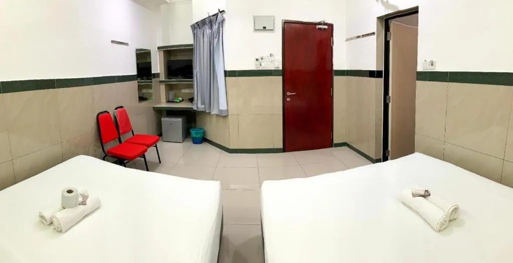 Bed in Burmahtel Hotel