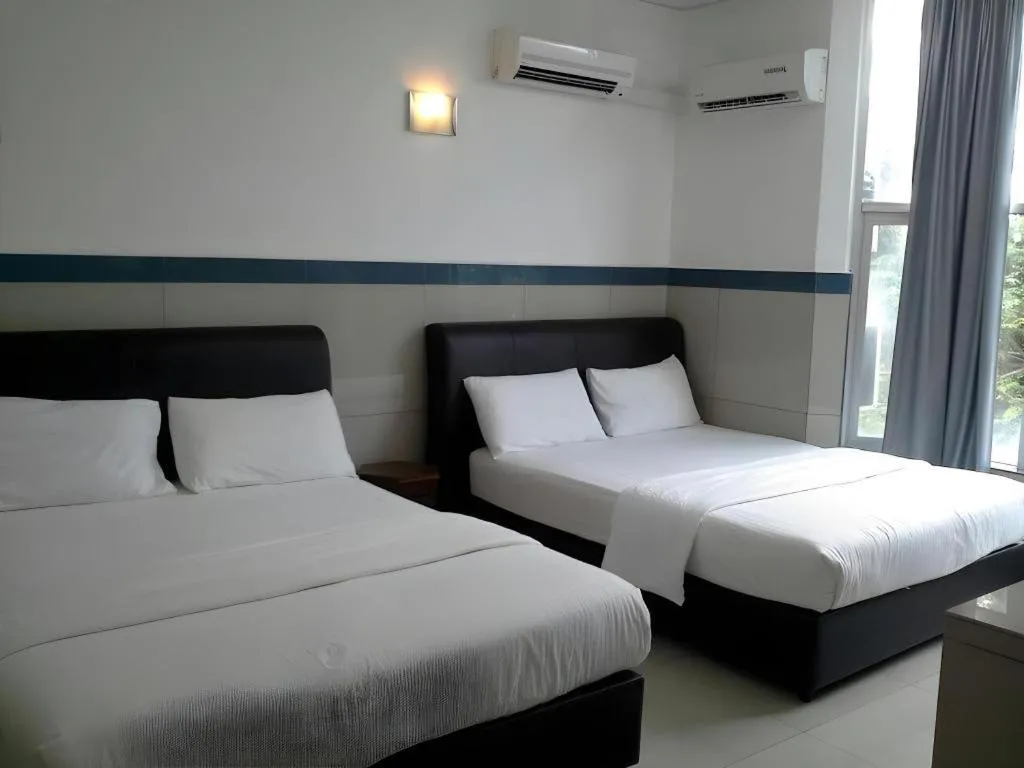 Bed in Burmahtel Hotel